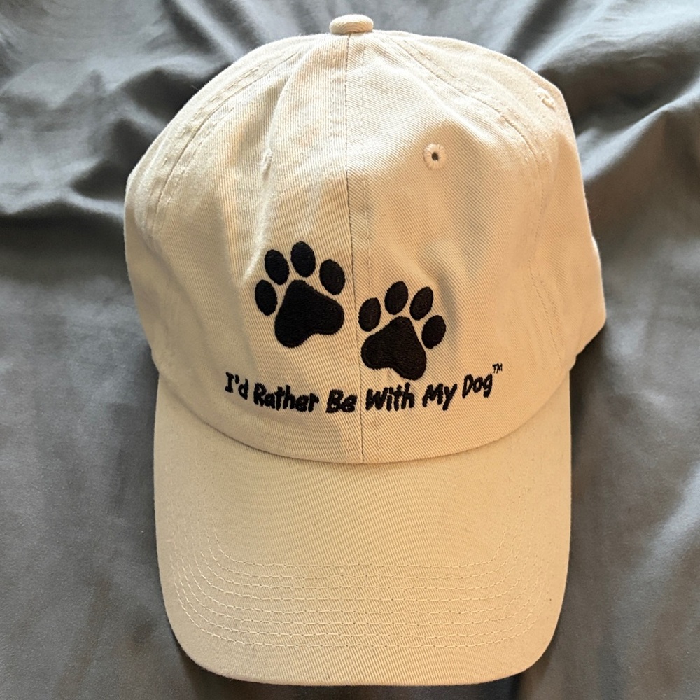Cream Cap with Paw Print Design